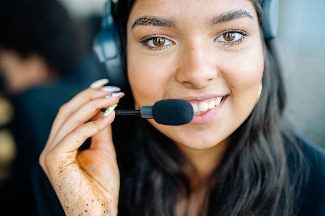 Person wearing headphones on a voice chat